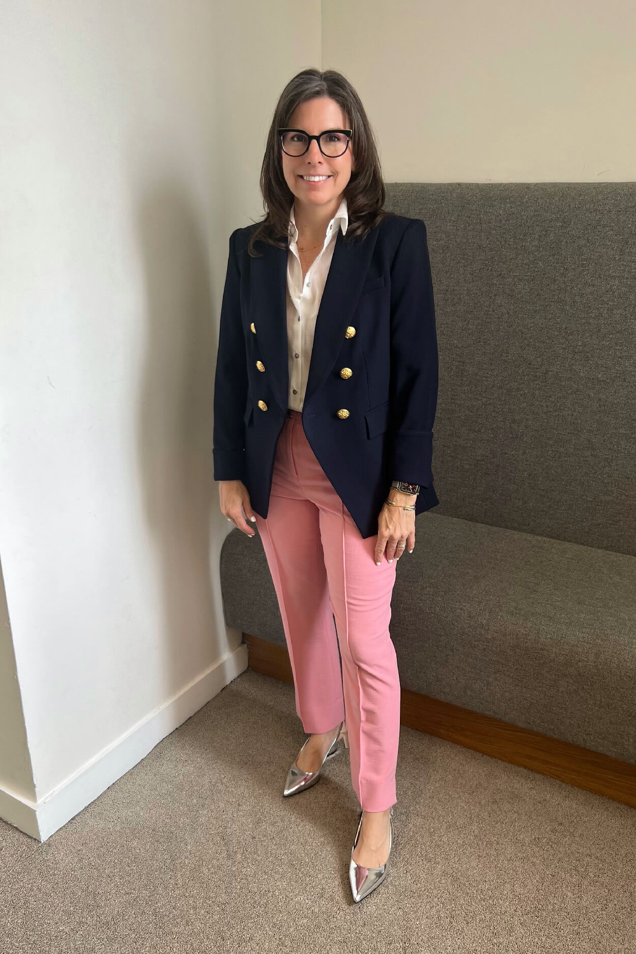 A workwear capsule wardrobe laid out with coordinated pieces
